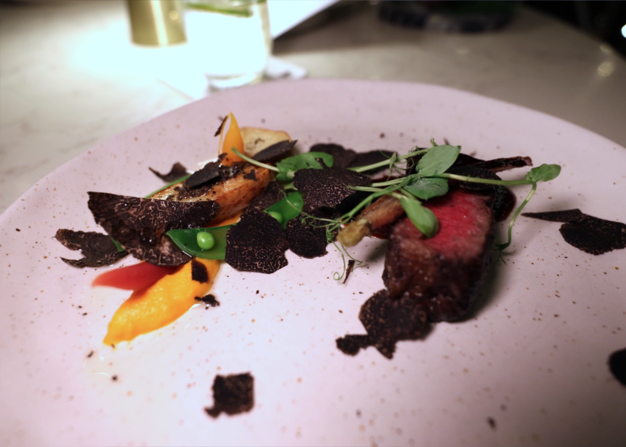 Wagyu with shaved truffle, carrot purée and baby vegetables