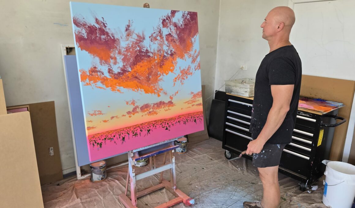 A vibrant contemporary landscape painting by Johnny K featuring thick impasto brushstrokes, magenta and cadmium orange sunset hues, and a soft aerosol sky.