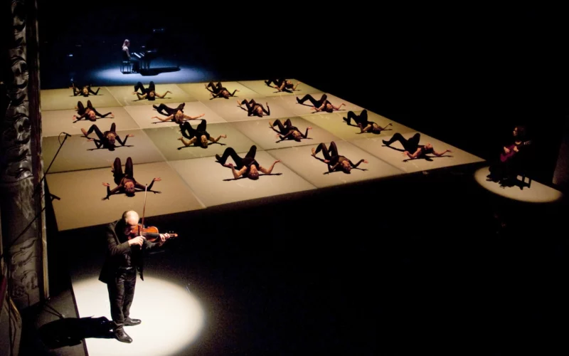 Dancers in Goyo Montero's Chacona for Queensland Ballet's Strings triple bill at QPAC with live musicians.